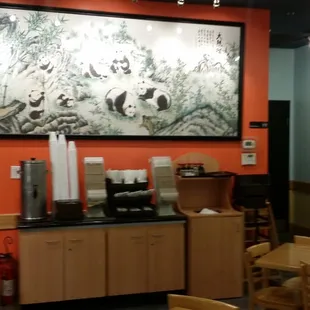 a woman at the counter of a chinese restaurant