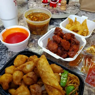 Sweet and sour lunch with lo meins and wings.