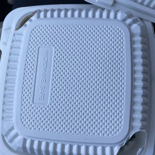 two plastic containers with lids