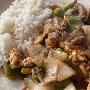 Hot Pepper Triple Delight $13.95 If you like Cajun spicy, I would recommend this. Beef, chicken and shrimp have a good texture, and the seas