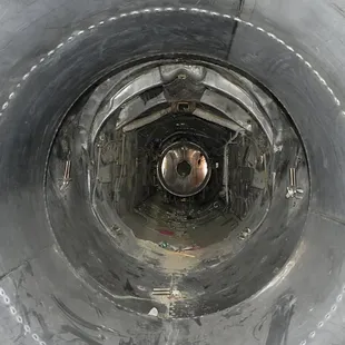 Inside one of the planes outside, gutted of its engine, now full of empty cans and other pieces of litter