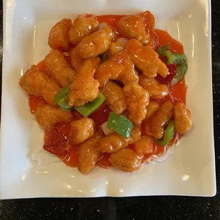 a plate of chicken and vegetables