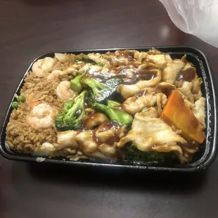 Shrimp fried rice and chicken and broccoli.