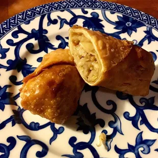 two pastries on a blue and white plate