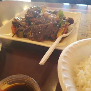 Beef with Garlic Sauce served on a real plate.