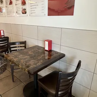 a table and chairs in a restaurant
