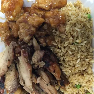 Bourbon and orange chicken with fried rice.