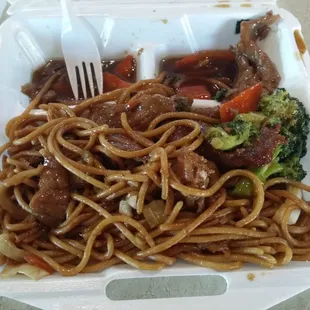 a meal in a styrofoam container