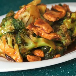 broccoli and chicken on a white plate