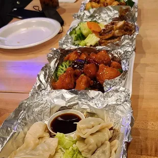 Pork Steam Dumpling. Orange Chicken.  Teriyaki chicken. Walnut Shrimp. PadThai. Thai Tea.