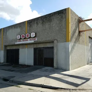 a stop sign on the side of the building