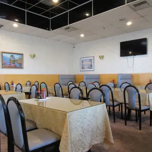 a large dining room with all tables, no booths