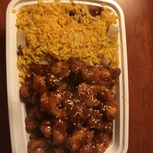 chicken and rice in a styrofoam container