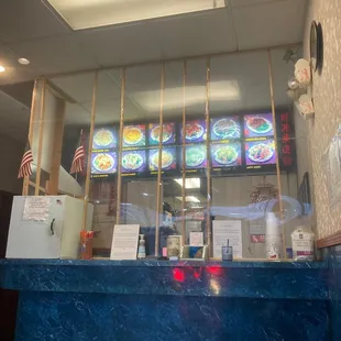 a blue counter and stained glass windows