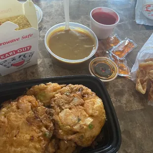 Shrimp Egg Fu Young w/gravy and fried rice. A side of crab rangoon w/sweet and sour sauce.