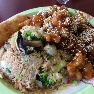 Sesame chicken with veggie fried rice and pork egg roll. Delicious! Good portion as well.