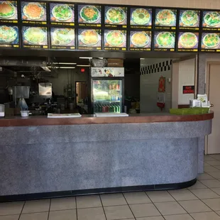 a view of a restaurant counter