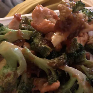 a plate of stir fried broccoli
