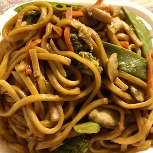 a plate of noodles and vegetables