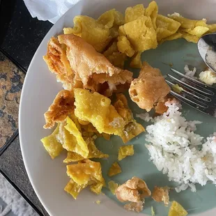 a plate of food and a fork