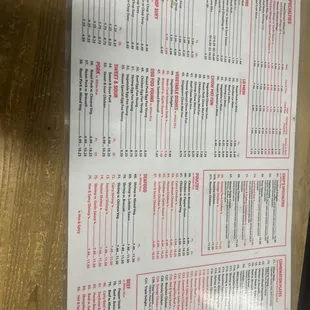a menu on a wooden table