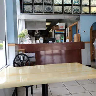 a man standing in a restaurant