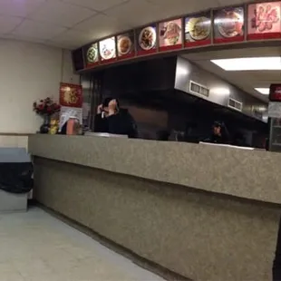 a woman at a restaurant counter