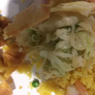 a plate of food with shrimp and rice