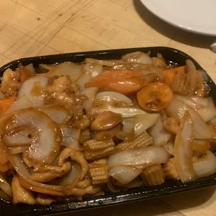 a plate of stir fried vegetables