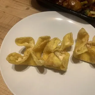 a plate of fried food on a table