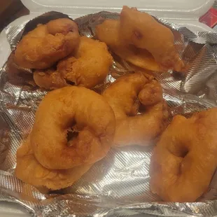 Sweet and sour shrimp without the sauce on it. Sauce is in separate container