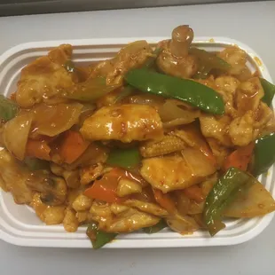 a plate of chicken and vegetables