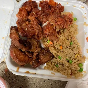 This is suppose to be orange chicken and I don't know what that other mystery meat is.