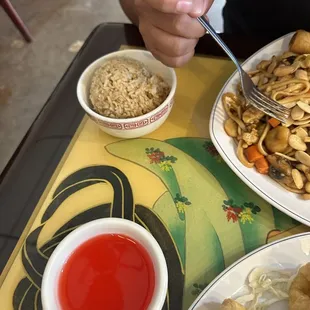 Sweet and sour sauce with side of fried rice