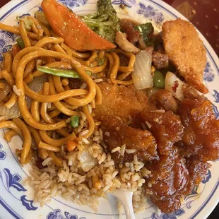 a plate of chinese food on a table