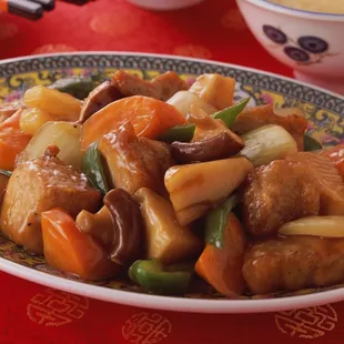 a plate of chinese food on a table