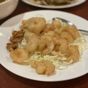 a plate of shrimp and noodles
