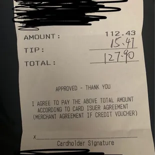 *BEWARE - Xi (the waitress) writing in a tip and expecting a signature from the guests.
