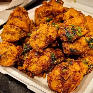 a tray of fried chicken
