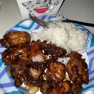 Orange chicken and steamed rice to go