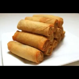 a plate of fried spring rolls