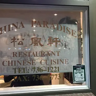 a sign in the window