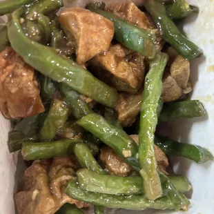 Very oily and overcooked green beans with tofu