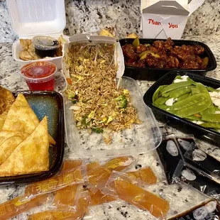 Our yummy feast! General Tso's Chicken, crab Rangoon, chicken Sauteed Snow Peas, Vegetable Fried Rice