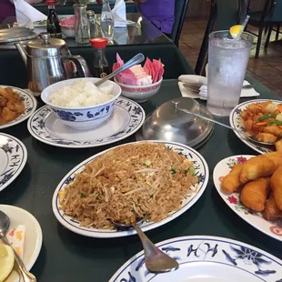 Sweet-and-sour chicken ,sweet and sour Pork,chicken fingers, egg and onion with bean sprout added fried rice.