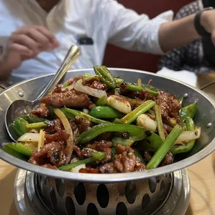 a bowl of stir fried vegetables