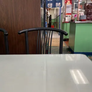a table and chairs in a restaurant
