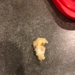 Chicken bone from the chicken in the fried rice