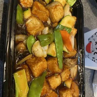 Buddha&apos;s Delight with fried tofu and fresh vegetables.