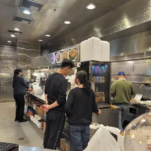 a group of people in a restaurant